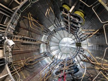 The interior of a central solenoid module shows the extensive network of helium piping needed to keep the superconducting magnet at 4 degrees Kelvin. US ITER is managing the fabrication of magnet modules at General Atomics in Poway, CA.  Photo credit: General Atomics