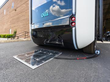 ORNL researchers installed and demonstrated their wireless charging technology for the first time on an autonomous vehicle – the Local Motors Olli shuttle bus. Credit: Carlos Jones/ORNL, U.S. Dept. of Energy
