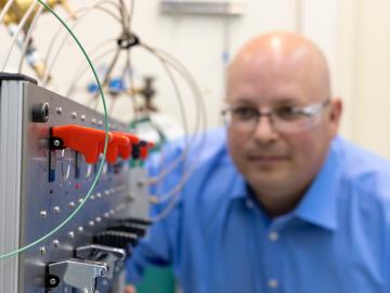 Kevin Gaddis with his automated HPIC that will go into a hot cell. 