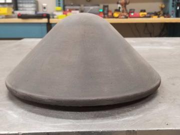 A 3D printed thermal protection shield, produced by ORNL researchers for NASA, is part of a cargo spacecraft bound for the International Space Station. The shield was printed at the Department of Energy’s Manufacturing Demonstration Facility at ORNL. Credit: ORNL, U.S. Dept. of Energy