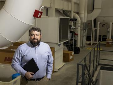 ORNL’s Jason DeGraw, a mechanical engineer and indoor air quality expert, uses numerical equations powered by high-performance computing to analyze and solve problems related to the dispersion patterns of biological pathogens as well as chemical irritants in buildings. Credit: ORNL, U.S. Dept. of Energy