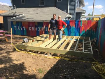 Brad, right, and son Micah Johnson work on a deck for Likewise in East Knoxville.