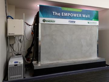 The 3D printed concrete smart wall installed at ORNL over the summer was monitored for energy efficiency, with preliminary results showing a minimum of 8% cost savings. Credit: ORNL, U.S. Dept. of Energy