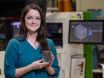Amy Elliott, ORNL’s group leader for robotics and intelligent systems, has been honored with the ASTM International Additive Manufacturing Young Professional Award for her early career research in materials science and STEM leadership. Credit: ORNL, U.S. Dept. of Energy