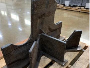 Oak Ridge National Laboratory researchers used big area additive manufacturing with metal to 3D print a steel component for a wind turbine, proving the technique as a viable alternative to conventional fabrication methods. Credit: ORNL, U.S. Dept. of Energy