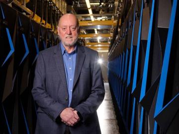 Dongarra in 2019 with Oak Ridge National Laboratory's Summit supercomputer