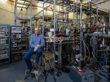 Physicist Charles Havener uses the NASA end station at ORNL’s Multicharged Ion Research Facility to simulate the origin of X-ray emissions from space. Credit: Carlos Jones/ORNL, U.S. Dept. of Energy