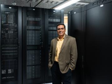 Giri Prakash, director of the ARM Data Center, works with the latest ARM computing cluster at ORNL. Credit: Carlos Jones/ORNL, U.S. Dept. of Energy