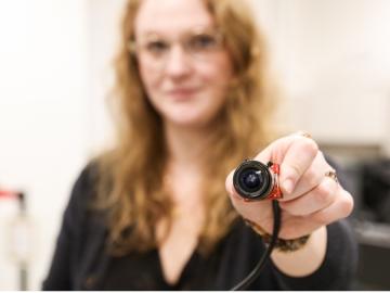 ORNL identity science researcher Nell Barber works on a facial recognition camera. Credit: Genevieve Martin/ORNL, U.S. Dept. of Energy
