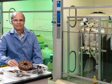 Oak Ridge National Laboratory’s Ramesh Bhave partnered with Momentum Technologies to develop a modular, scalable system for recycling scrap permanent magnets in e-waste. Credit: Carlos Jones/ORNL, U.S. Dept. of Energy