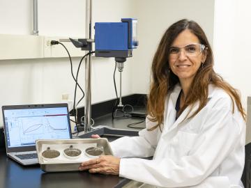 Materials scientist Denise Antunes da Silva researches ways to reduce concrete’s embodied carbon in the Sustainable Building Materials Laboratory at ORNL, a research space dedicated to studying environmentally friendly building materials. Credit: ORNL, U.S. Dept. of Energy