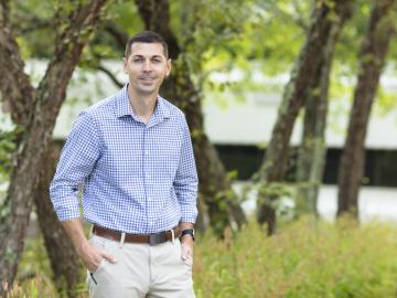 Maj Matt Postupack poses outside at the ORNL campus