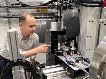 NASA scientist Andrew Needham used the MARS neutron imaging instrument at Oak Ridge National Laboratory to study moon rock samples brought back from the Apollo missions. Credit: Jeremy Rumsey/ORNL, U.S. Dept. of Energy