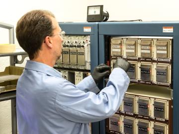 Marc Chattin of Oak Ridge National Laboratory uses an alpha spectrometer to analyze samples of isotopic plutonium with an ISO 17025-accredited method. Credit: Carlos Jones/ORNL, U.S. Dept. of Energy