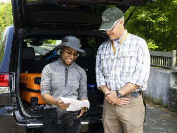 From left, Gladisol Smith Vega prepares to collect field data on the Oak Ridge Reservation with mentor Scott Brooks. Credit: Carlos Jones/ORNL. U.S. Dept. of Energy