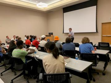 ORNL’s Travis Humble, Quantum Science Center director, addresses students during a working lunch. Credit: Teresa Hurt/ORNL, U.S. Dept. of Energy