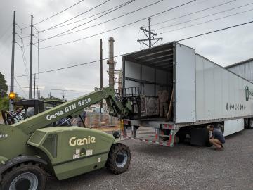 Plutonium oxide is loaded onto a truck for shipping. Adam Parkison/ORNL, U.S. Dept. of Energy