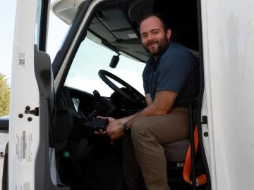 Sam Hollifield displays a prototype of the Secure Hijack, Intrusion and Exploit Layered Detector, or SHIELD, the device monitoring the cybersecurity of the semi-truck. Credit: Lena Shoemaker/ORNL, U.S. Dept. of Energy