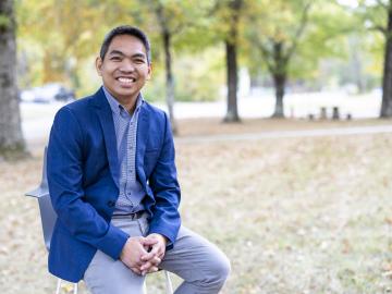 Christian Salvador is studying natural and manmade aerosols at Oak Ridge National Laboratory to improve our understanding of how atmospheric pollutants affect ecosystems and the Earth’s climate. Credit: Carlos Jones/ORNL, U.S. Dept. of Energy