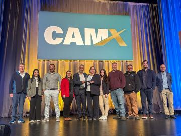 SM2ART team members receive the CAMX Combined Strength Award at the Georgia World Congress Center in Atlanta. Pictured here are, from left, ORNL’s Dan Coughlin, Sana Elyas, Halil Tekinalp, Amber Hubbard, Soydan Ozcan; University of Maine’s Susan MacKay, Angelina Buzzelli, Scott Tomlinson, Wesley Bisson; and ORNL’s Matt Korey and Vlastimil Kunc. Credit: University of Maine