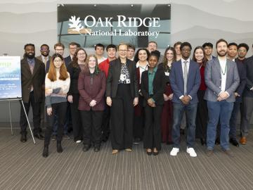 Mandy Mahoney, third from left, director of the DOE Office Of Energy Efficiency and Renewable Energy’s Building Technologies Office, welcomed 21 students representing seven universities across the nation to the sixth annual JUMP into STEM finals competition at Oak Ridge National Laboratory. Credit: Kurt Weiss/ORNL, U.S. Dept. of Energy