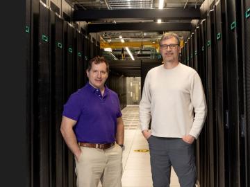 Architects of the Adaptable IO System, seen here with Frontier's Orion file system: Scott Klasky, left, heads the ADIOS project and leads ORNL's Workflow Systems group, and Norbert Podhorszki, an ORNL computer scientist, oversees ADIOS's continuing development. Credit: Genevieve Martin/ORNL, U.S. Dept. of Energy