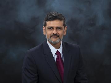 Man in suit with red tie