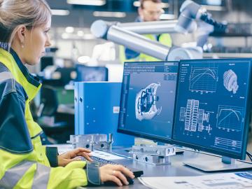 Engineer working on computer design / Adobe Stock