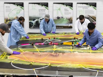 Team working on in green composites design for their fully-recyclable wind turbine blade tip incorporating low-cost carbon fiber
