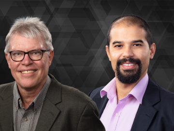 ORNL researchers Tom Beck and Daniel Claudino are pictured here in a graphic with grey background
