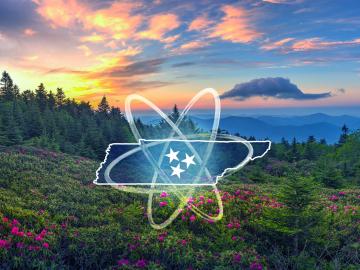 "Nuclear is here" graphic with the mountains and a nuclear symbol 