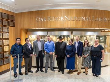 Group of Highly Cited researchers stand for a photo after receiving the award