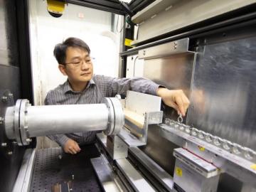 Shuo Qian preps the Bio-SANS instrument.