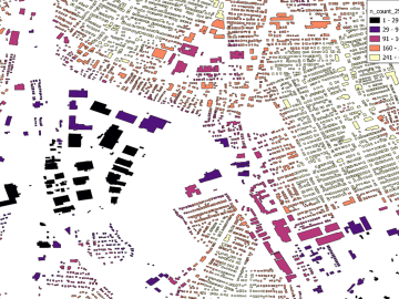 Pictured is a map that is color-coded into purple, black, orange, pink and yellow to depict building density and color based on morphology to predict height