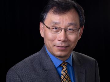 An ORNL researcher portrait on a black background