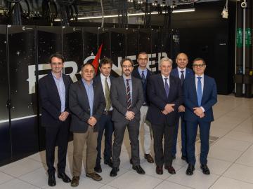 Group image in front of Frontier super computer.