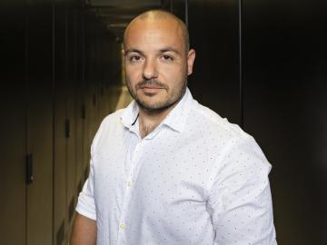 Max Pasini casual portrait in between server cabinets