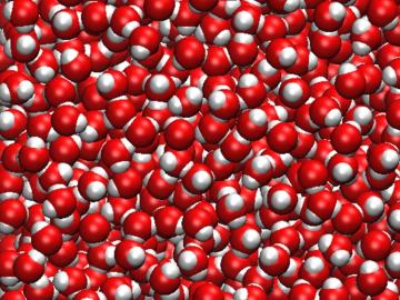 Molecular simulation of water showing densely packed H₂O molecules, with red spheres representing oxygen atoms and white spheres representing hydrogen atoms.