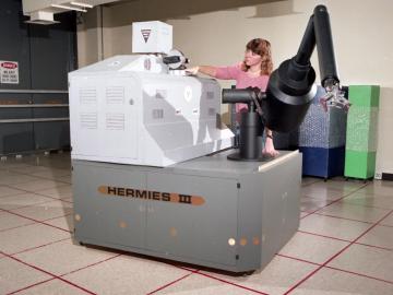 Baldwin with the HERMIES III robot at ORNL in 1988. Photo courtesy, ORNL.