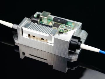 An existing Qubitekk prototype will leverage ORNL’s single-photon source approach, bringing the device closer to generating pairs of quantum light particles in a controlled, deterministic manner that is useful for quantum encryption. Image by Qubitekk.