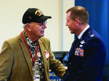 Col. Lee  Hartley (right) with ORNL retiree and World War II veteran Ernest Shepherd. (ORNL photo by Rachel Brooks) 