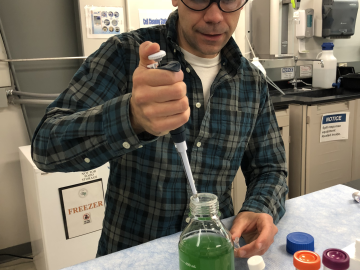 Postdoctoral researcher Cory Knoot prepares a sample of blue-green algae for neutron scattering experiment on the Bio-SANS instrument at ORNL’s High Flux Isotope Reactor. Credit: Kelley Smith/Oak Ridge National Laboratory, U.S. Dept. of Energy Postdoctoral researcher Cory Knoot prepares a sample of blue-green algae for neutron scattering experiment on the Bio-SANS instrument at ORNL’s High Flux Isotope Reactor. Credit: Kelley Smith/Oak Ridge National Laboratory, U.S. Dept. of Energy