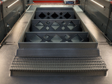 Researchers 3D printed molds for precasting concrete using the Big Area Additive Manufacturing, or BAAM™, system at DOE’s Manufacturing Demonstration Facility at ORNL. Complex, durable mold designs can be produced in less time than traditional wood or fib