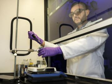 Oak Ridge National Laboratory researcher Halil Tekinalp combines silanes and polylactic acid to create supertough renewable plastic.