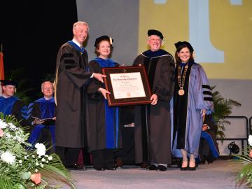 Bredesen Center Director Lee Riedinger, from left, University of Tennessee, Knoxville Vice Provost and Dean of the Graduate School Dixie Thompson, former Tennessee Gov. Phil Bredesen, and UT Knoxville Chancellor Beverly Davenport gather together as the sc