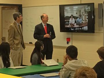 ORNL Director Thom Mason and Knox County Schools Superintendent Jim McIntyre visited a Farragut High School classroom that is linked to West High School through distance learning equipment contributed by UT-Battelle. ORNL Director Thom Mason and Knox County Schools Superintendent Jim McIntyre visited a Farragut High School classroom that is linked to West High School through distance learning equipment contributed by UT-Battelle.