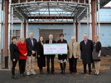 On hand for UT-Battelle's check presentation at the new facility construction site.