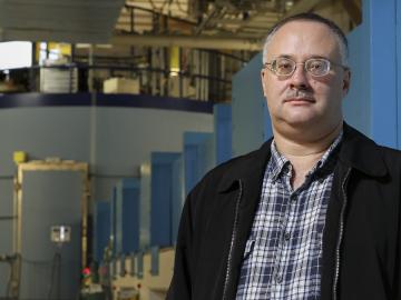 Eugene Mamontov and the BASIS beam line at the Spallation Neutron Source at ORNL. Photo credit: Jason Richards, ORNL.