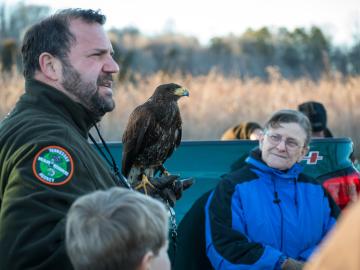 Vincent Pontello of the Tennessee Wildlife Resources Agency displays a Harris’s hawk during a 2015 nature walk. Photo by Nicholas Morris.