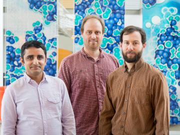 ORNL researchers have discovered a new type of quantum critical point, a new way in which materials change from one state of matter to another. Featured here are researchers Lekh Poudel (left), Andrew Christianson and Andrew May. 